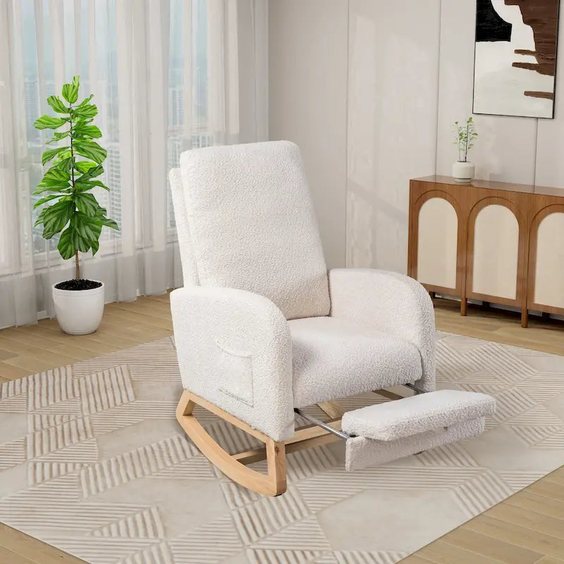 Fauteuil à bascule à dossier haut avec repose-pieds rétractable