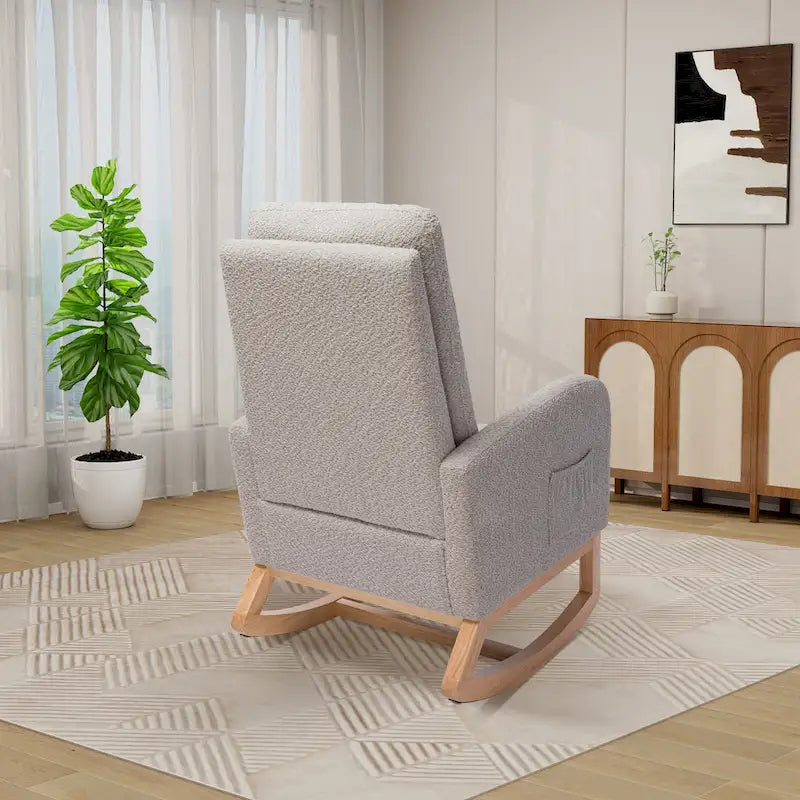 Fauteuil à bascule à dossier haut avec repose-pieds rétractable